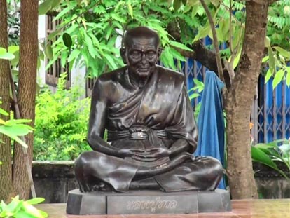 Sitting monk statue at Wat Boonimit in Udon Thani